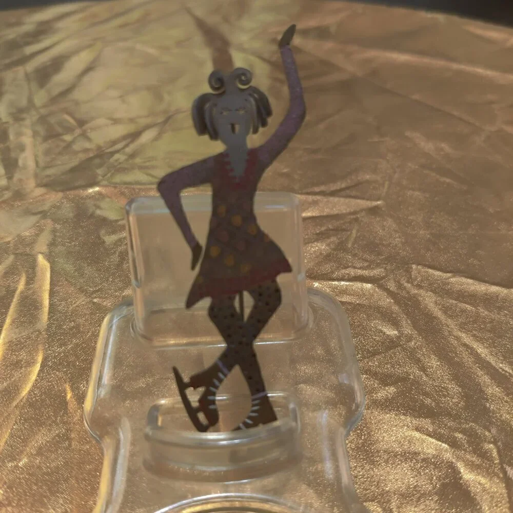 Brooch of a whimsical girl Figure Skater. Signed GB.